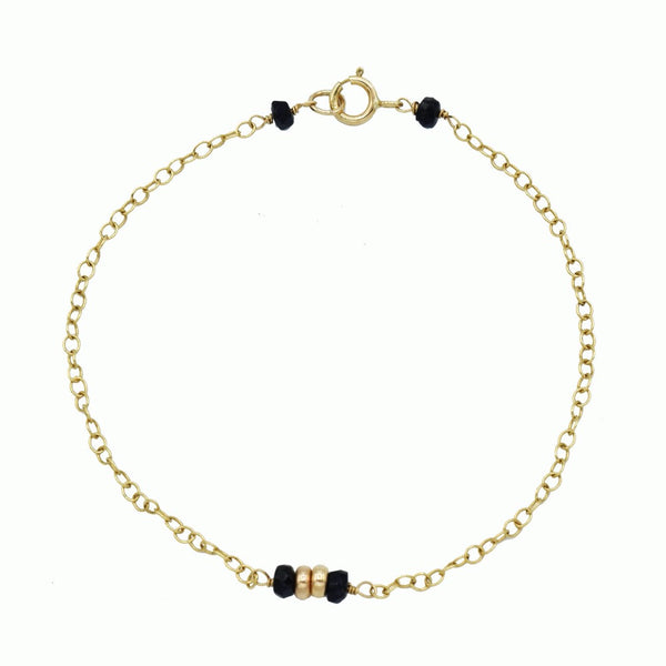 Gold bracelet with black tourmaline