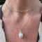 Pearl and snake necklace
