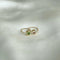 Twist earring with gemstone