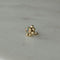 Twist earring with round stone and gold details