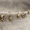 Twist earring with gemstone