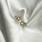 Earring with gold details