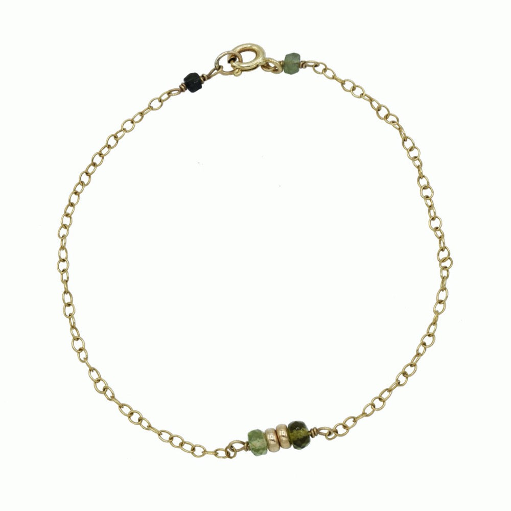 Gold bracelet with green tourmaline
