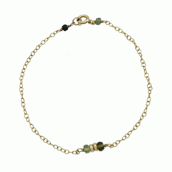 Gold bracelet with green tourmaline
