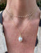 Gold necklace with pearls