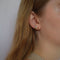 Earring with gold details
