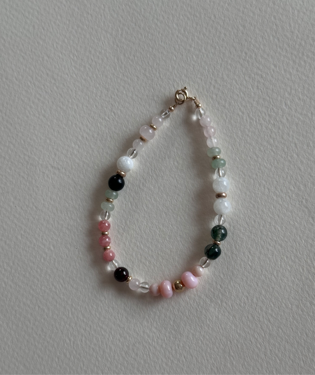 Gemstone and gold bracelet