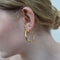 Earring with gold details